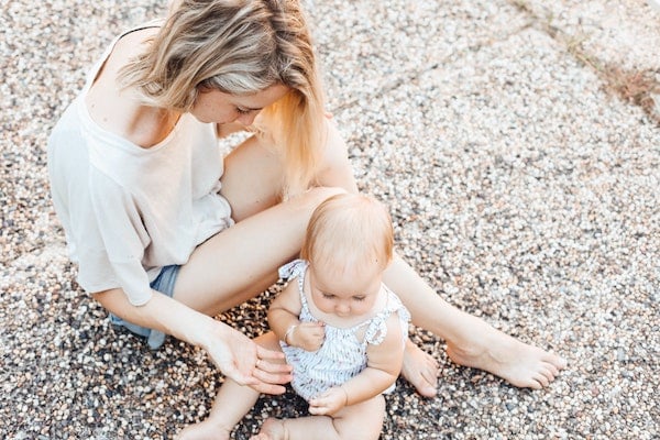 mother playing with her baby | The Peaceful Sleeper 