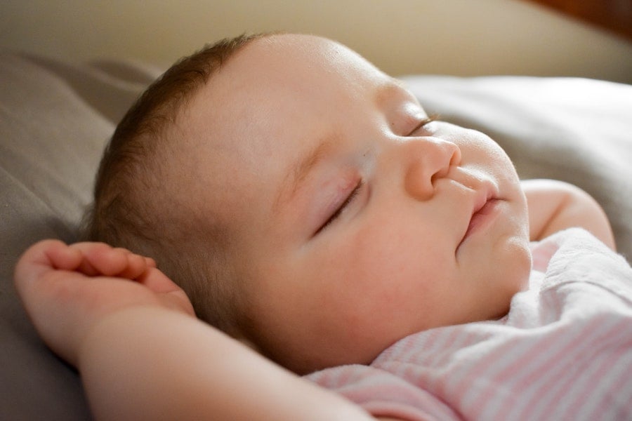 a small baby going through a sleep regression | The Peaceful Sleeper 