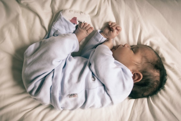 a baby sleeping through the night | The Peaceful Sleeper 