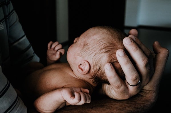 father using different ways to get his newborn to sleep | The Peaceful Sleeper 