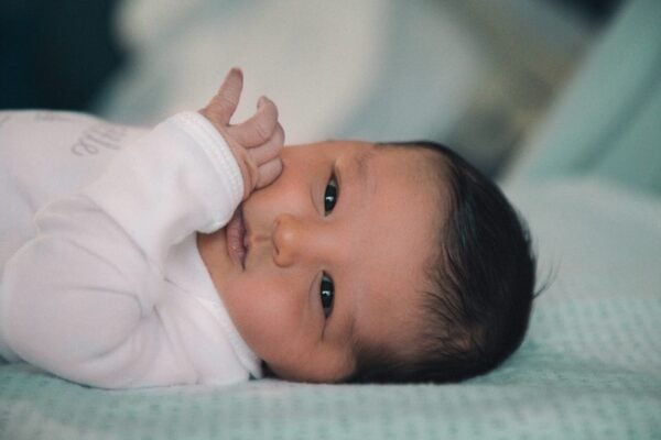 Newborn getting sleepy and showing a sleep cue |The Peaceful Sleeper