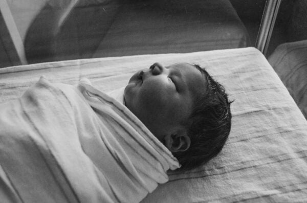 Newborn swaddled for sleep |The Peaceful Sleeper