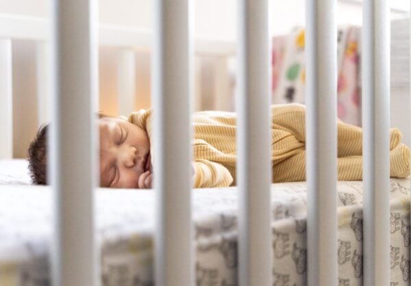 8 month old baby sleeping in a crib | The Peaceful Sleeper
