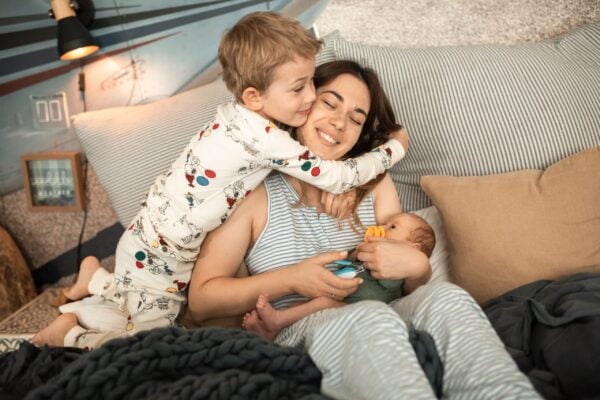 Toddler helping newborn nap |The Peaceful Sleeper