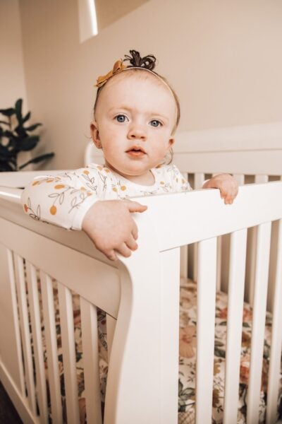 Toddler standing in crib |The Peaceful Sleeper