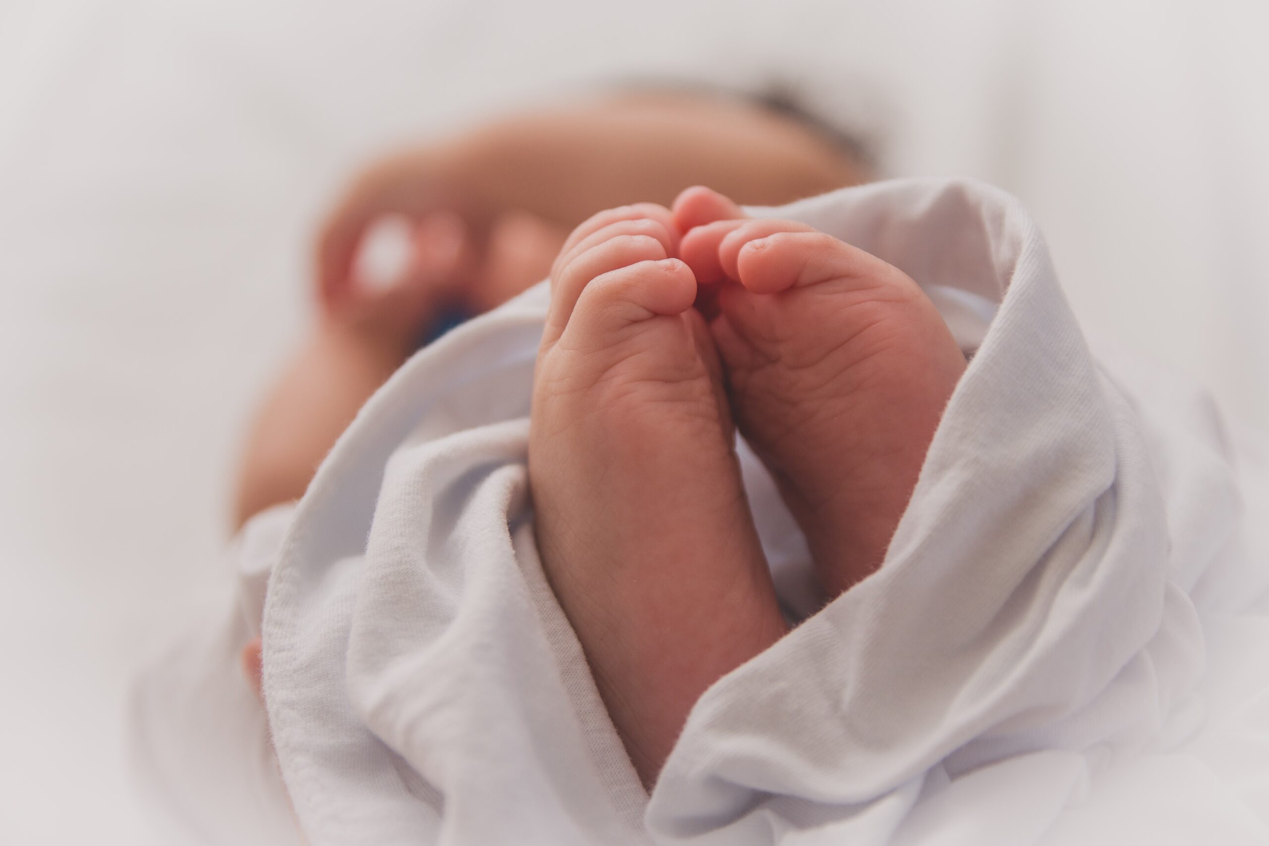 Baby fights the online swaddle