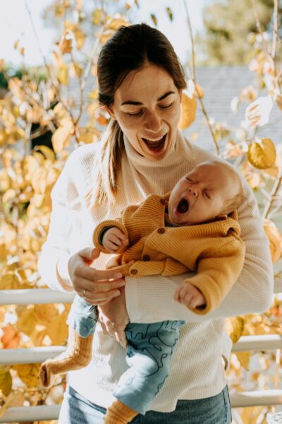 Mom Holding Baby - You Are a Better Mom Than You Think Blog | The Peaceful Sleeper