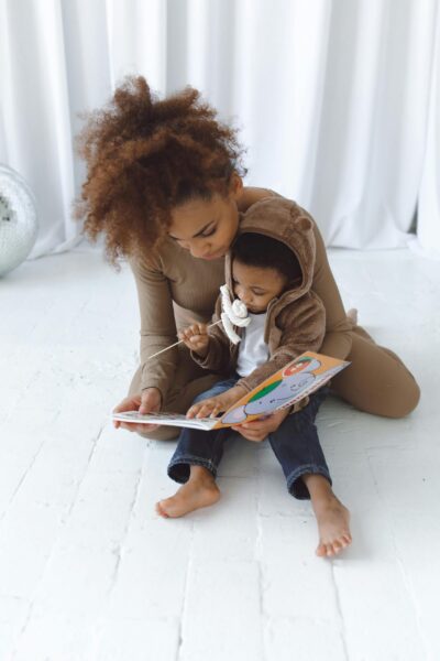 Mom and Child Reading a Book | The Peaceful Sleeper