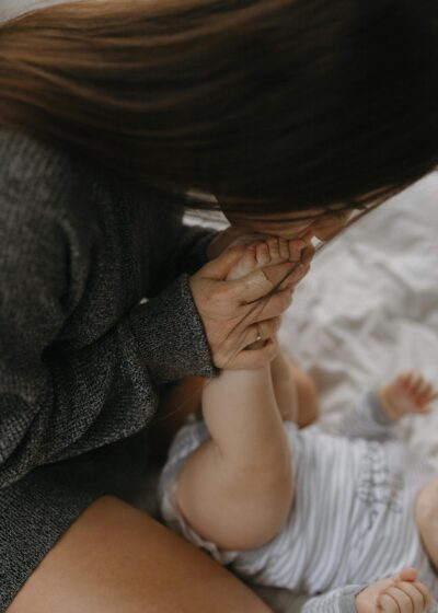 Mom Kissing Baby's Feet | The Peaceful Sleeper